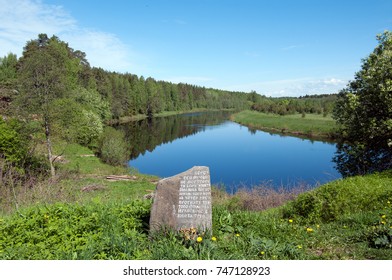 Green Bank, Vologda Region / Russia - June 10, 2017: The Andoga River And The Memorial Stone. 