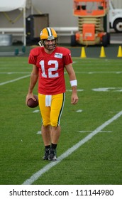 GREEN BAY, WI - AUGUST 19 : Green Bay Packers Quarterback Aaron Rodgers During Training Camp Practice On August 19, 2012 In Green Bay, WI