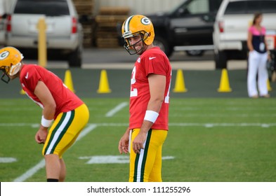 GREEN BAY, WI - AUGUST 19 : Green Bay Packers Quarterback Aaron Rodgers During Training Camp Practice On August 19, 2012 In Green Bay, WI