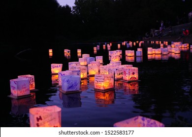 Green Bay, Wisconsin / USA - August 18, 2019 Water Lantern Festival held their event in Green Bay at Pamperin Park, many attendees designed their water lantern to be sent down stream. 