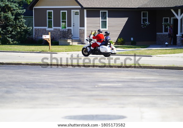 Green Bay,\
Wisconsin / USA - August 29th, 2020: Pro Trump blue lives matter\
motorcyclists, police vehicles and other vehicles drove through\
green bay as a parade to show\
support.