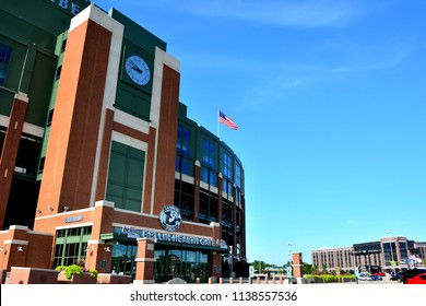 Green Bay, Wisconsin / USA - July 19, 2018: The main entrance at Lambeau Field is known as the Bellin Healthcare gate.  Neighborhood buildings in the background. 