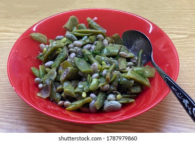 Green Bean Salad Drenched In Oil And Herbs
