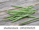 Green beans on wooden background. Healthy vegetarian food Natural products. Fresh harvest bean organic meal