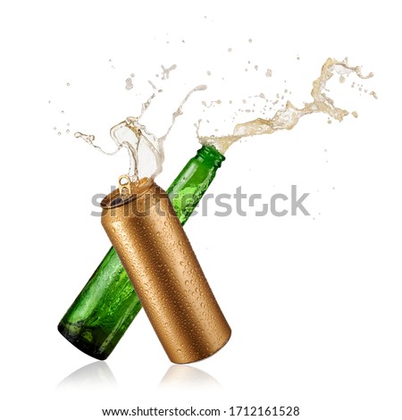 Green beer bottle and golden beer can toast and splash, close up