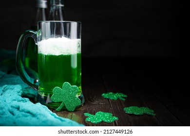 Green Beer Pint For Saint Patrick Day On Wooden Table