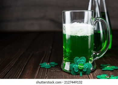 Green Beer Pint For Saint Patrick Day On Wooden Table