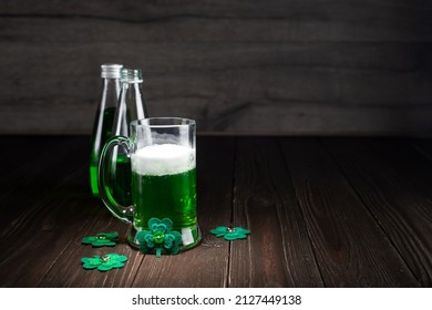 Green Beer Pint For Saint Patrick Day On Wooden Table