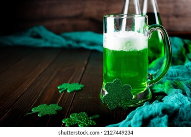 Green Beer Pint For Saint Patrick Day On Wooden Table