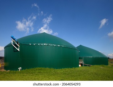 Green Biogas Plant Digester With Blue Sky