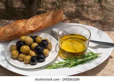 Green And Black Olives,lemon And Bread.Rustic Table Setting.Summer Sunny Day In Countryside.