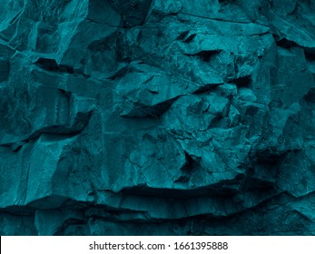 Green blue abstract grunge background. Toned rock texture. Texture of the mountains closeup. The combination of teal color and rough rocky shape. Volumetric stone background. 3D effect.              - Shutterstock ID 1661395888