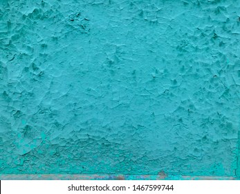 green blue turquoise concrete wall with deep relief and shadows. rough texture surface