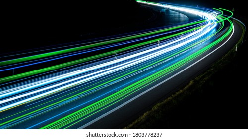 Green, Blue And White Car Lights On The Road At Night