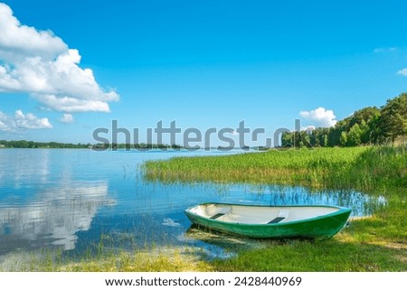 Green boat by Lake Peipus shore. Värska, Estonia, Baltic States
