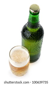 The Green Bottle Of Beer And A Glass Of Beer Top View  On White Background