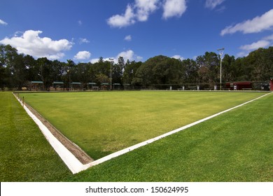 Green Bowls Or Lawn Bowls Player Ground Which Is Natural Grass Or Artificial Turf Surrounded With Spot Light, Scorecard Etc.