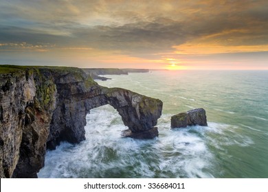 The Green Bridge Of Wales At Sunrise.