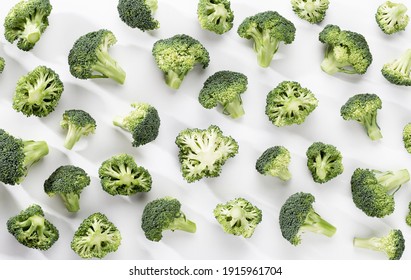 Green Broccoli Pattern Food. Isolated Vegetable On White Background. Top View.