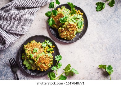 Green Broccoli And Pea Pancakes (cutlets) On Black Plate. Healthy Vegan Food Concept.