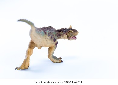 Green and brown Long Running Carnotaurus - back view