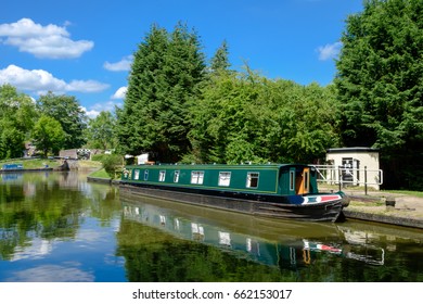 Green Canal Boat In Birmingham Canal At Lapworth