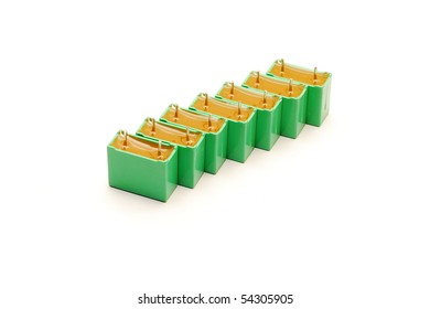 green capacitors isolated on white