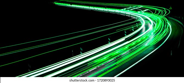 green car lights at night. long exposure - Shutterstock ID 1720893025