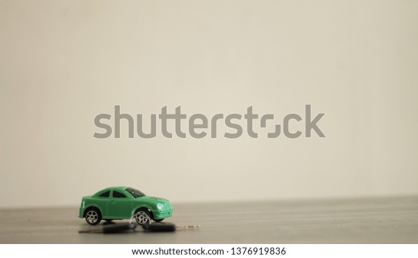 green car and two black\
keys