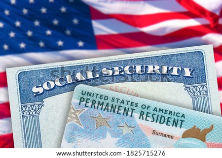 Green Card US Permanent resident USA and Social Security card. Electronic Diversity Visa Lottery DV-2022 DV Lottery Results. United States of America. American flag on background. 