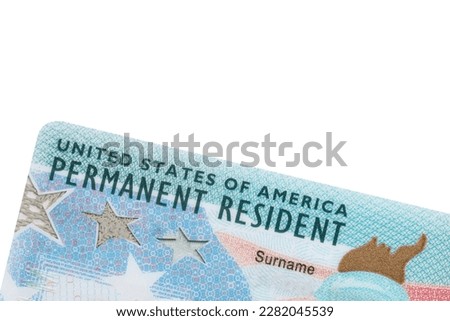 Green Card. US Permanent resident card. Immigration to USA. Electronic Diversity Visa Lottery DV-2024 DV Lottery Results. United States of America. American dream. White isolated background.