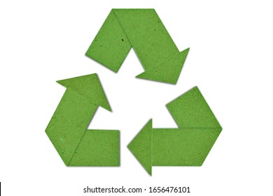 Green cardboard recycling symbol - Concept of ecology and paper recycling 
