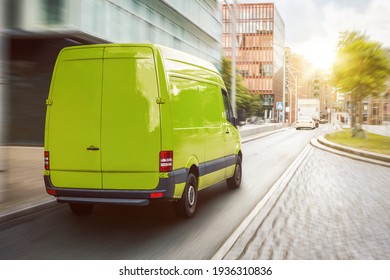 Green Cargo Van Driving In The City