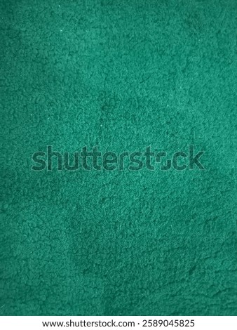 green carpet background. close up of green carpet