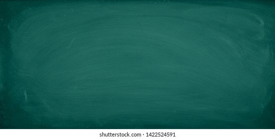 Green Chalkboard. Chalk texture school board display for background. chalk traces erased with copy space for add text or graphic design. Backdrop of Education concepts 