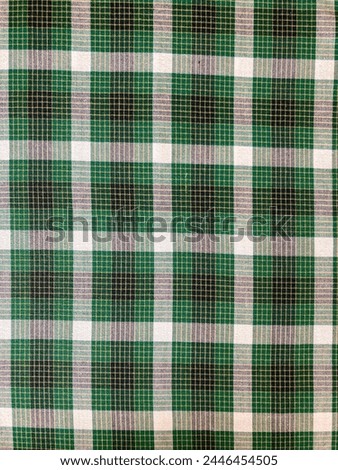 Green checkered cloth pattern can be used as sarong pattern.