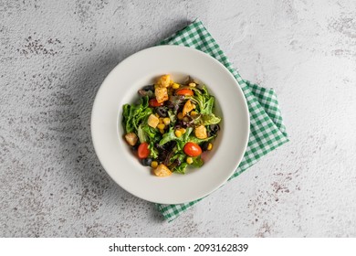 Green Chef Salat With Avocado, Corn, Peanut, Cucumber, Potato, Tomato, Salad Leafs, Broccoli And Western Pieces. A Combo Of Fresh Green Vegetable Salad A Health Meal.