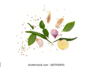 Green chili, shallot, garlic, pepper, cumin, basil, kaffir lime leaves, lemongrass and galangal isolated on a white background, top view, flat lay.