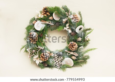 Green christmas wreath with  eco decorations isolated on