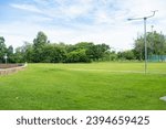 Green city public park meadow grass sunshine blue sky with cloud nature landscpae