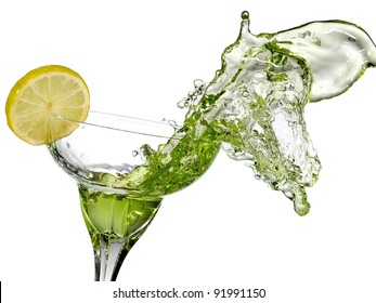 Green cocktail with lemon splash from a margarita glass