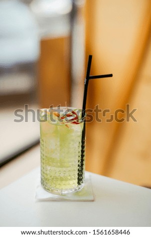 Green cocktail in luxury restaurant.