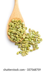 Green Coffee Beans In Wooden Spoon On White Background