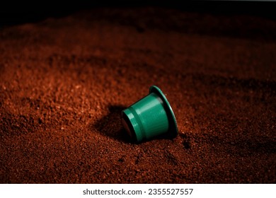 Green Coffee Capsule with Ground Coffee Background