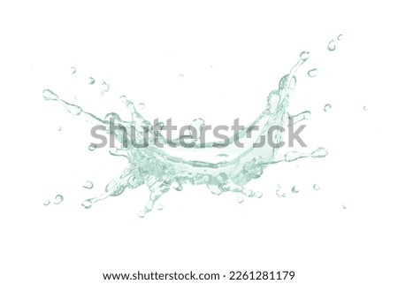 Green collagen water splashing isolated on white background. Water serum droplet for cosmetic, beauty and spa concept.