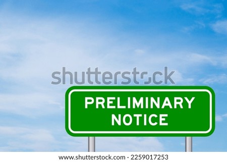 Green color transportation sign with word preliminary notice on blue sky with white cloud background