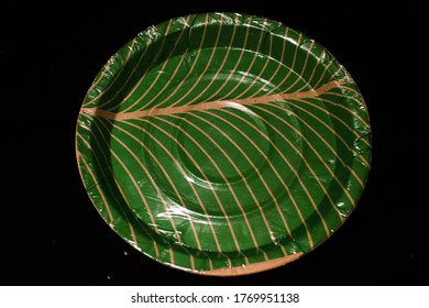 Green Coloured Paper Plate For Having Snacks, Dinner, Lunch And Breakfast. Made In India. Specially Used For Functions And Any Type Of Ceremonies. 