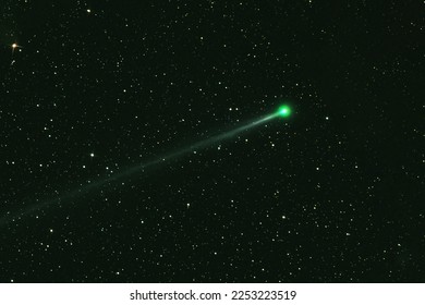 Green comet in dark space. Elements of this image furnished by NASA. High quality photo - Shutterstock ID 2253223519