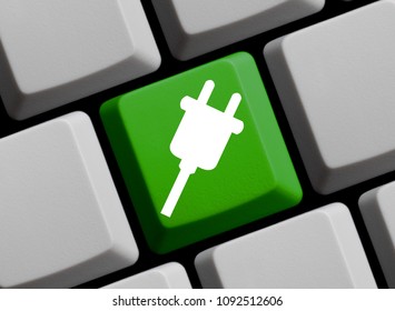 Green Computer Keyboard showing Plug