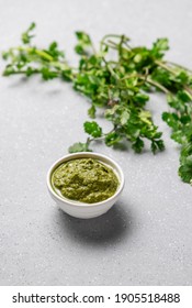 Green Coriander Chutney In White Bowl